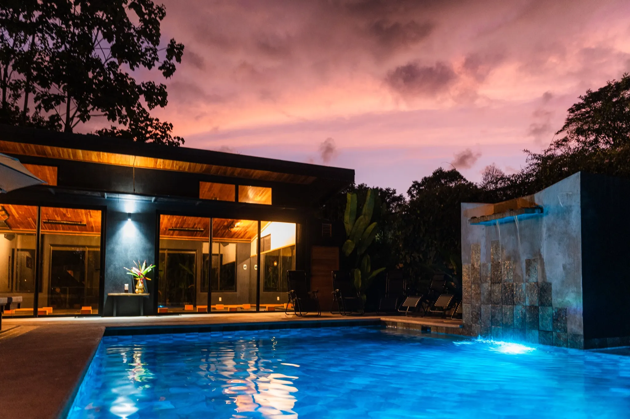 yoga studio and pool at dusk